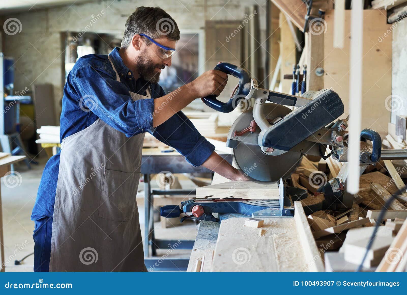 Carpenter Using Electric Cutting Unit Stock Image Image of machine