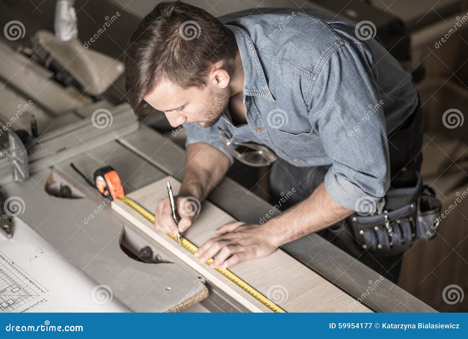 Carpenter Using a Measuring Tape Stock Image Image of wooden