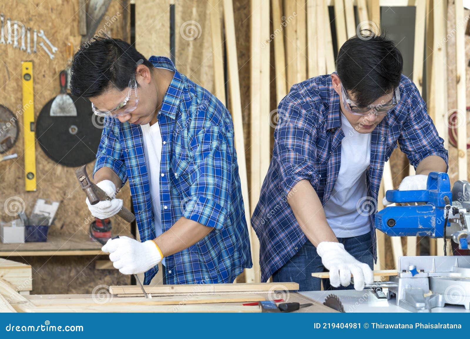 Carpenter Using Planning Machine at Carpentry Shop. Wood Processing