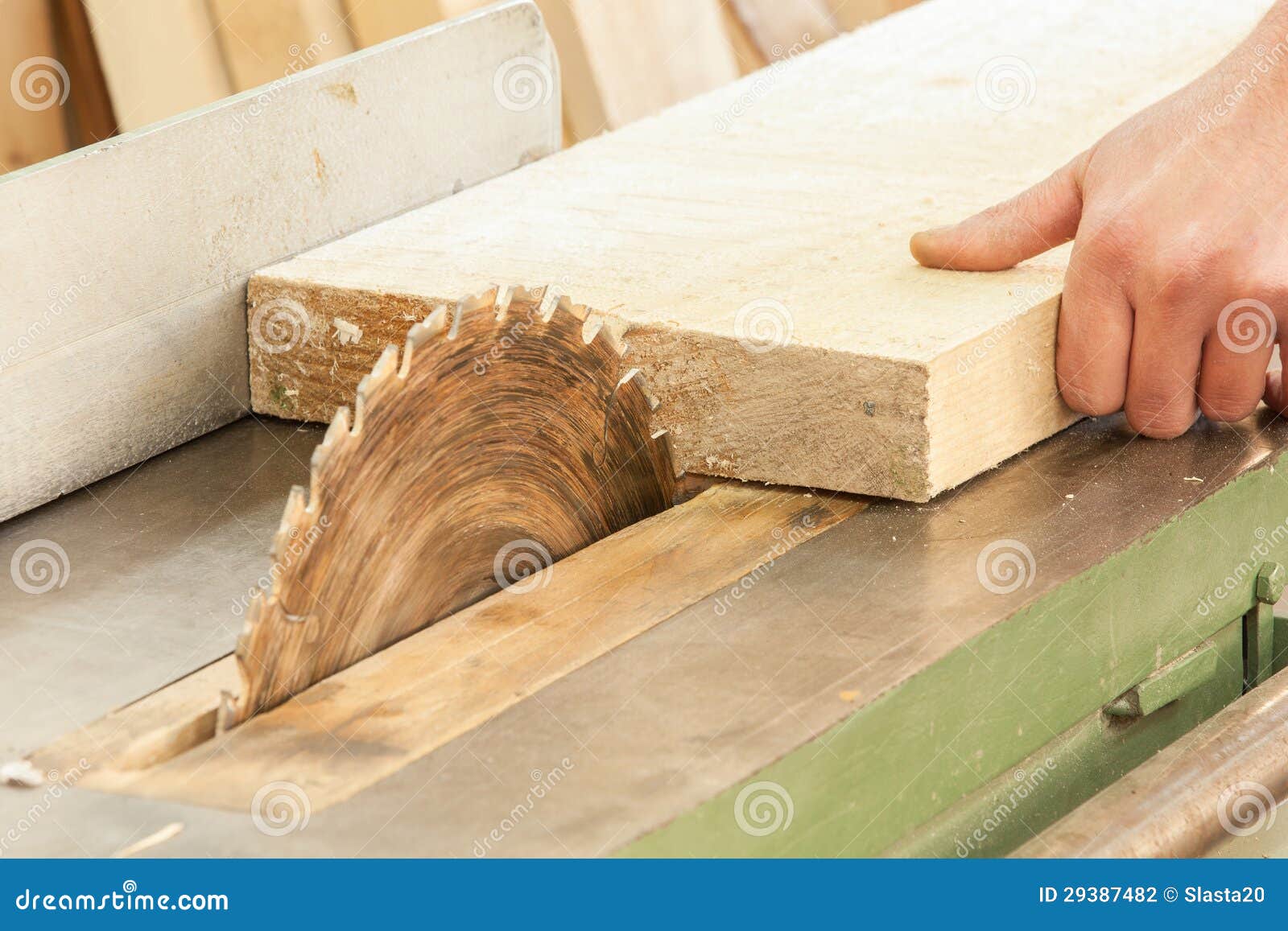 Carpenter Working On Woodworking Machines In Carpe Stock 