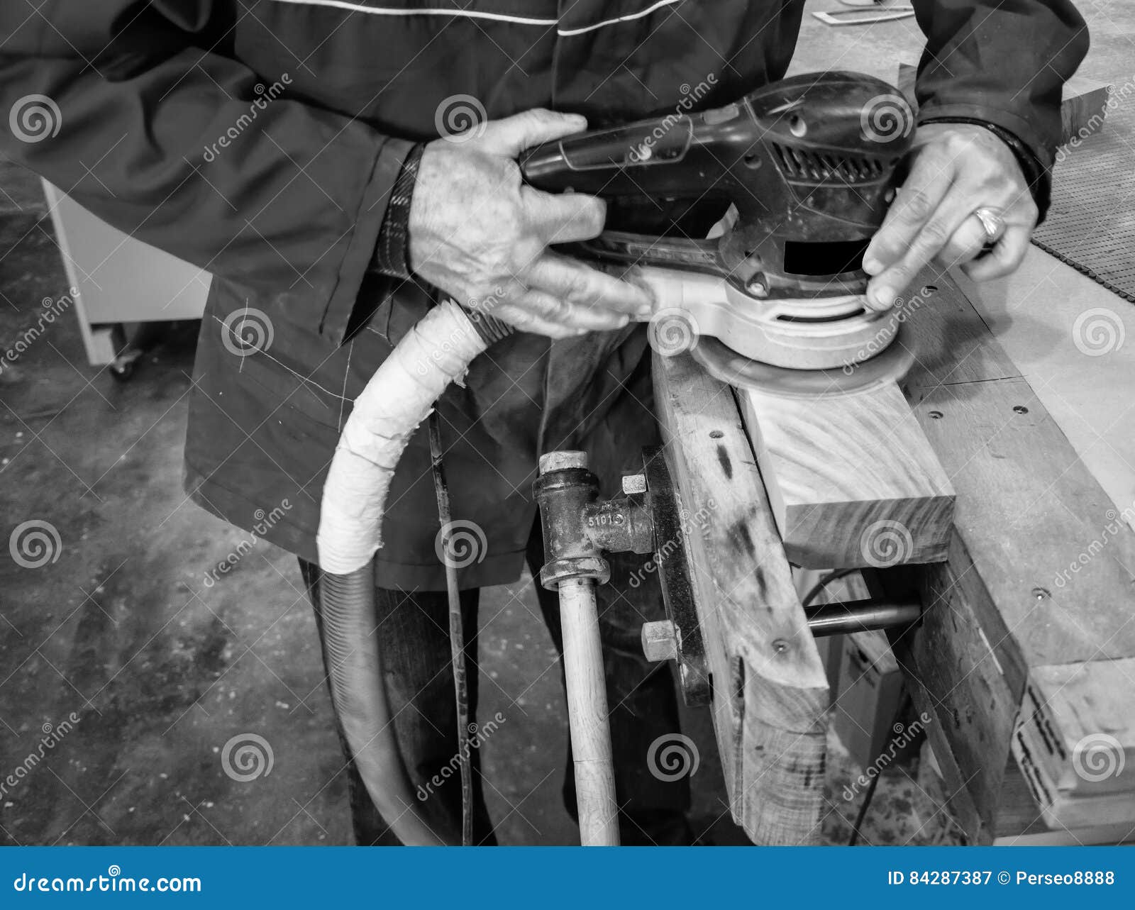 Carpenter Workplace Polishing the Wood through the Machine. Stock