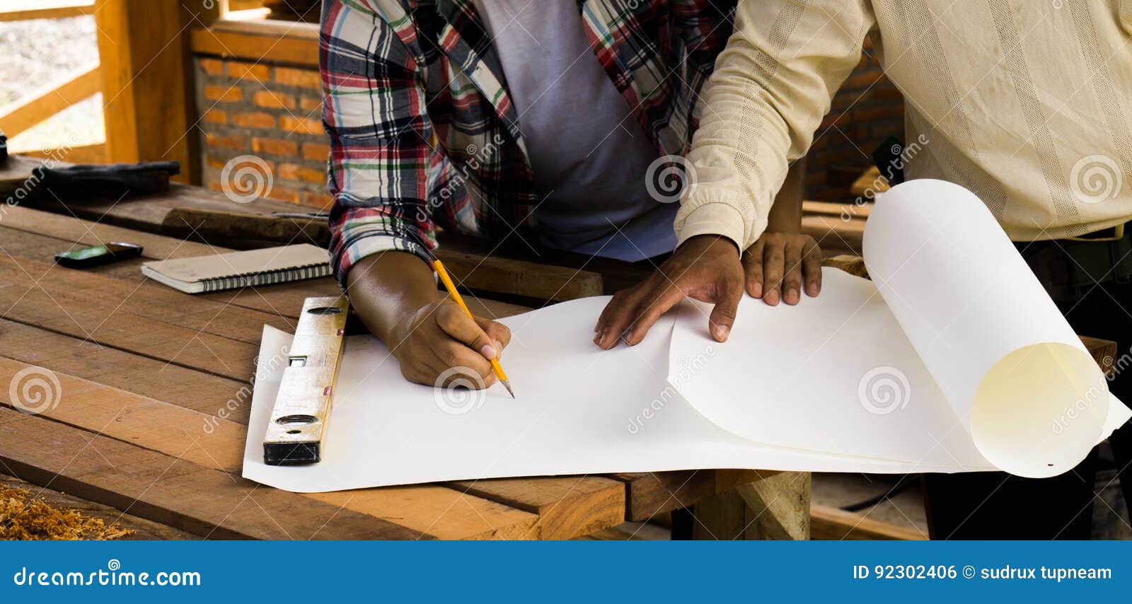 carpenters are planning to build a home