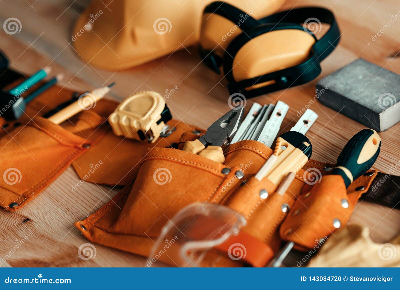 Carpentry Wools and Protective Equipment on the Desk Stock Photo