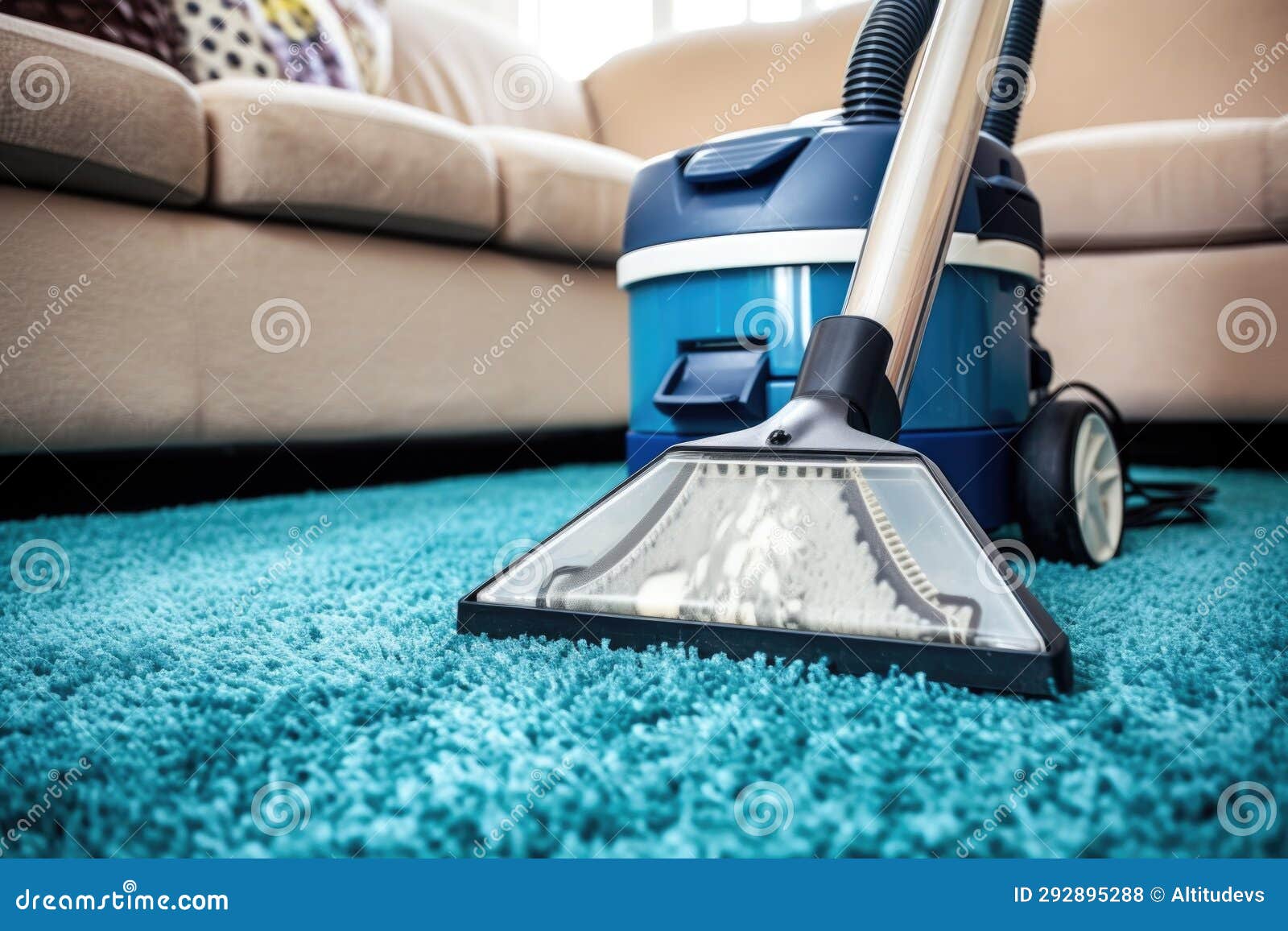 Carpet Cleaner Machine Cleaning a Vibrant Plush Carpet Stock Photo