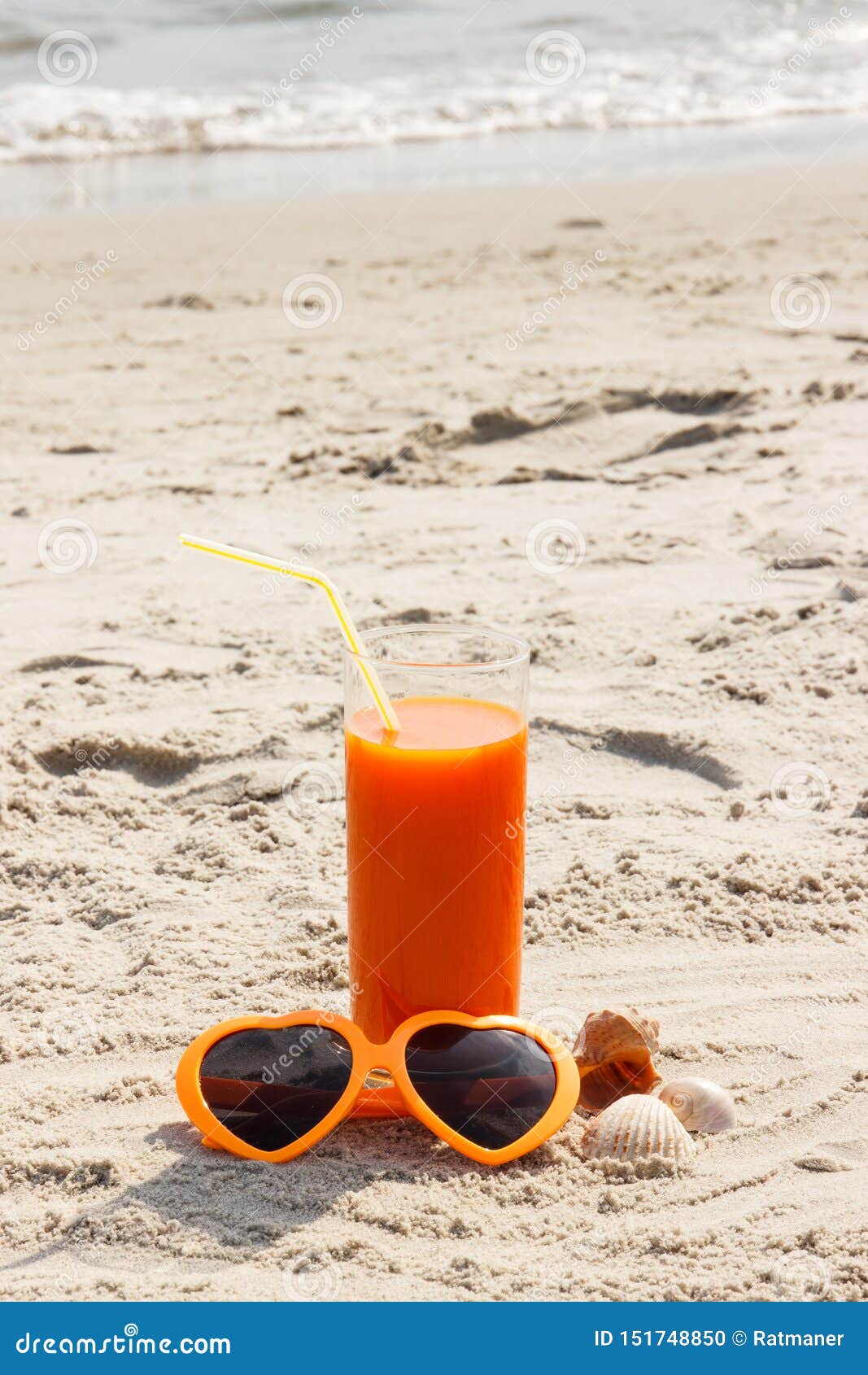 Carrot Juice And Sunglasses At Beach Concept Of Vitamin A And