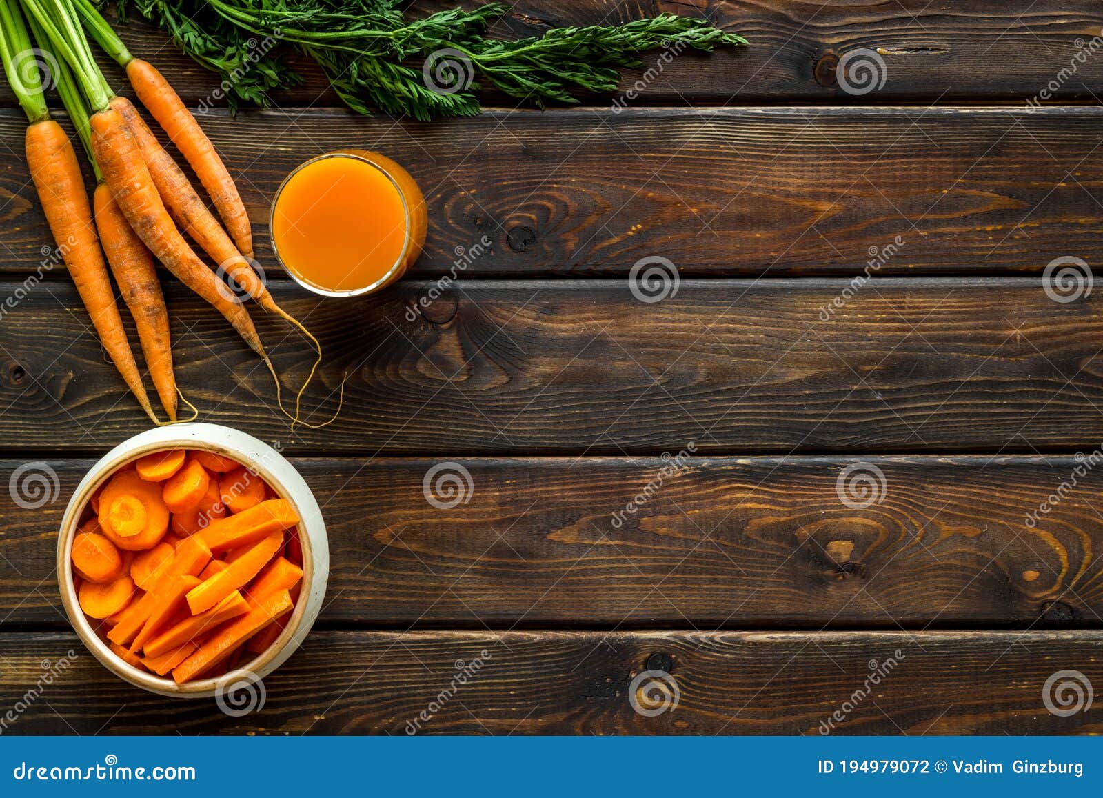 Carrot Slices, Juice, Green Tops Topdown Copy Space Stock Photo