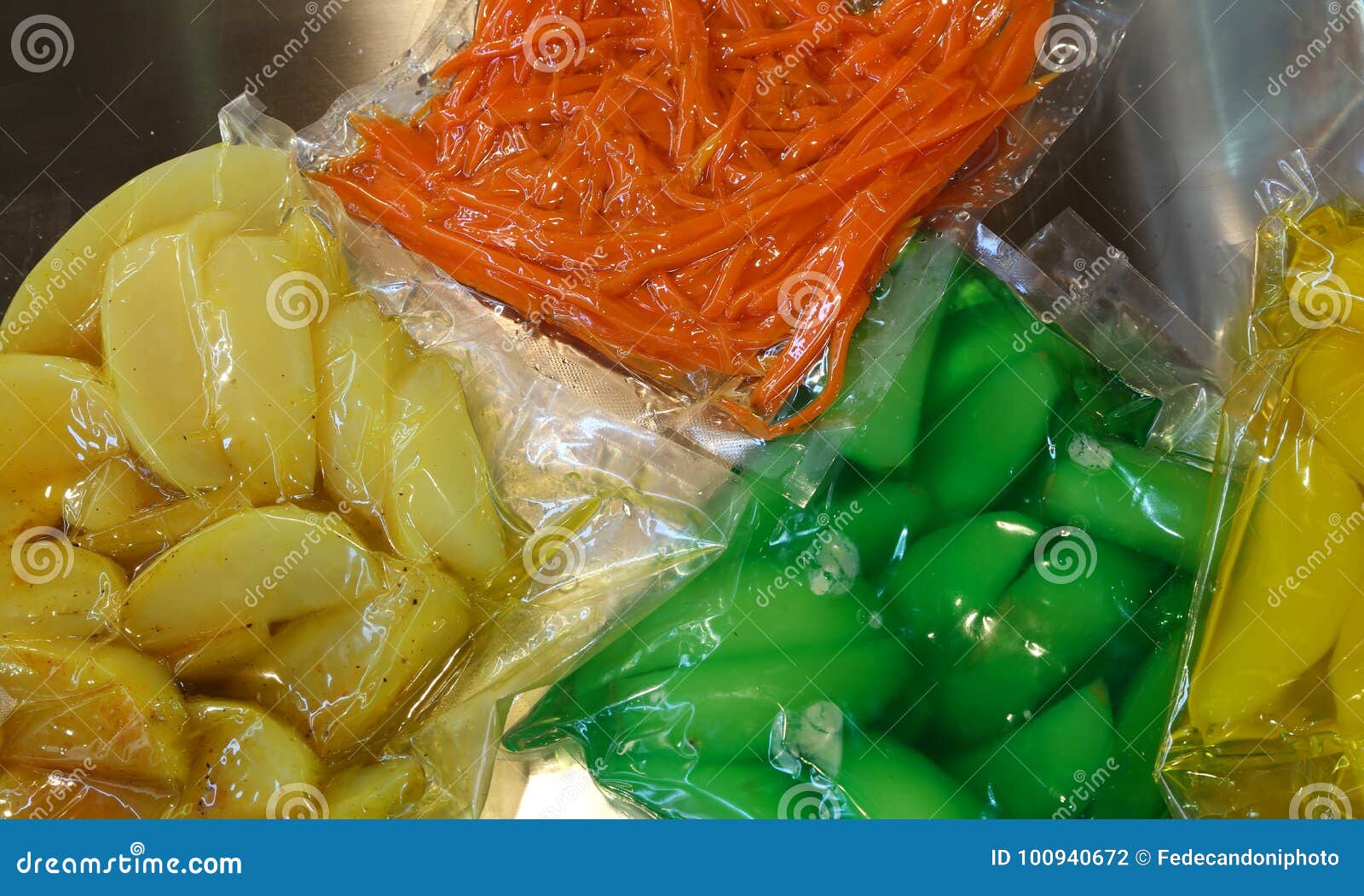 Carrots Apples Pears and Other Cooked Vegetables are Vacuum Pack Stock