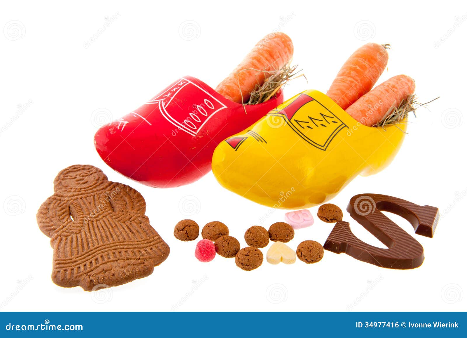 Dutch wooden clogs in red and yellow with carrots for the horse of 