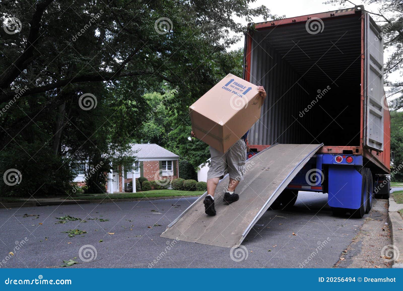 carrying box into moving truck