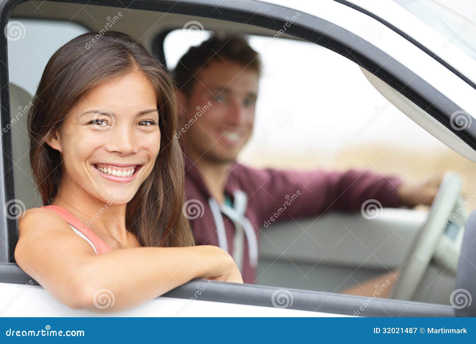 cars-couple-driving-new-car-smiling-happy-looking-camera-young-people-road-trip-drive-beautiful-interracial-32021487.jpg