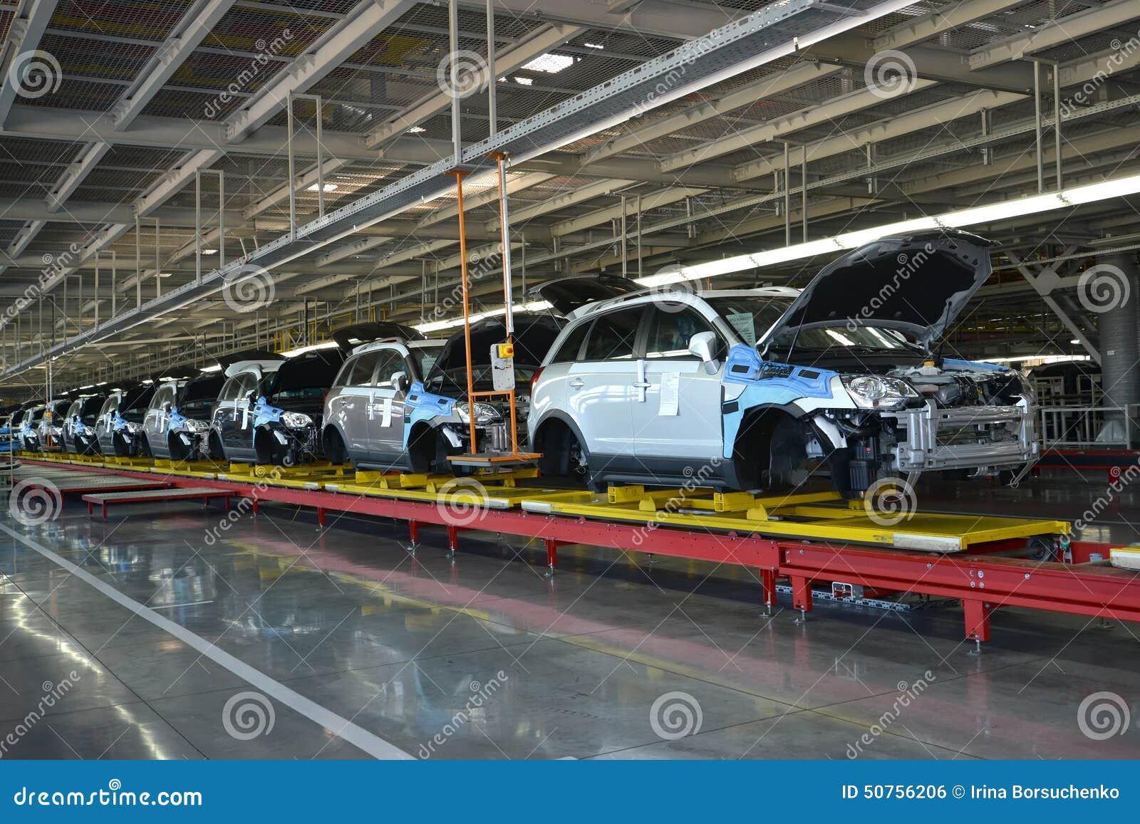 Cars Stand on the Conveyor Line of Assembly Shop. Automobile Pro Stock