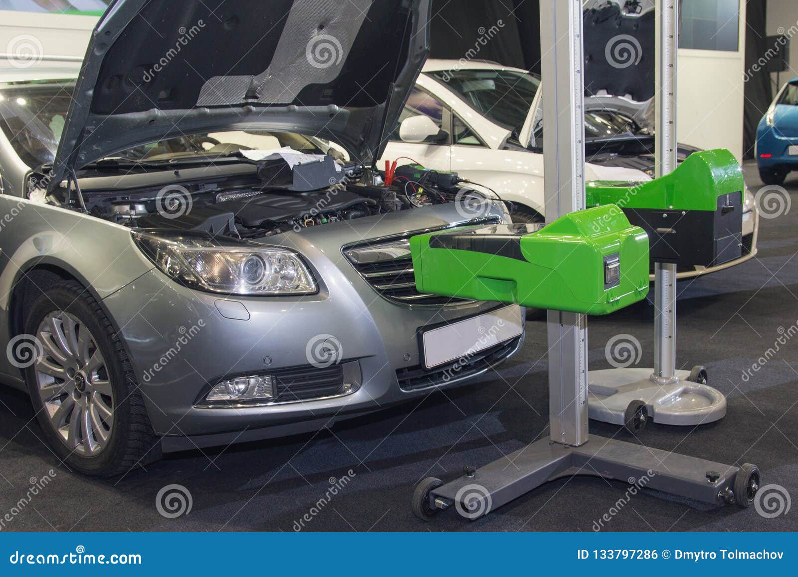 Cars Standing in the Service Station and Car Equipment for Adjusting