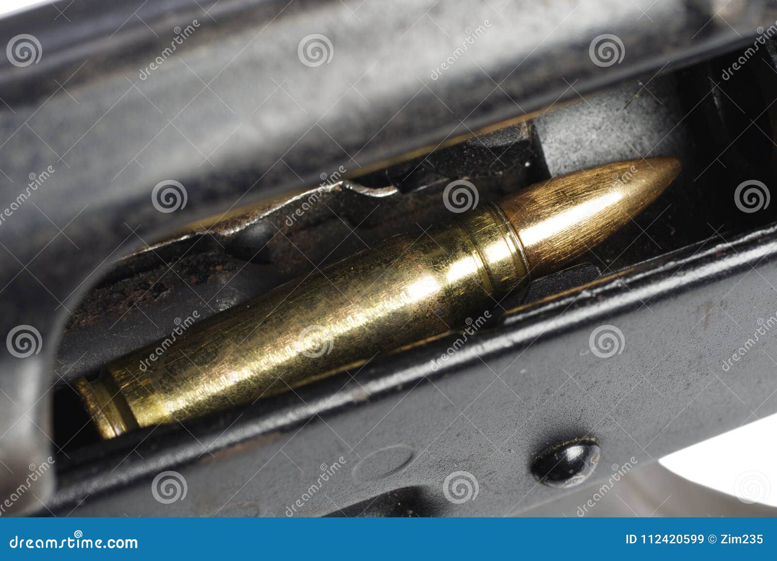 Cartridge in the receiver stock image. Image of caliber 112420599