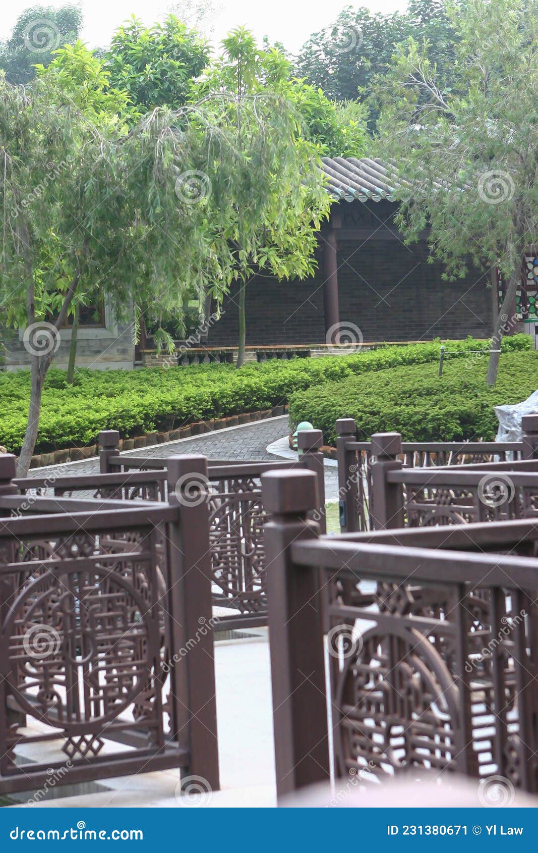 A Carved Bridge in Chinese Style on a River , Lingnan Garden Stock