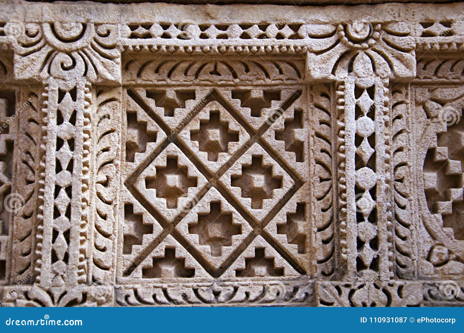 carved patola double ikat pattern on the inner wall of rani ki vav, an intricately constructed stepwell on the banks of saraswat