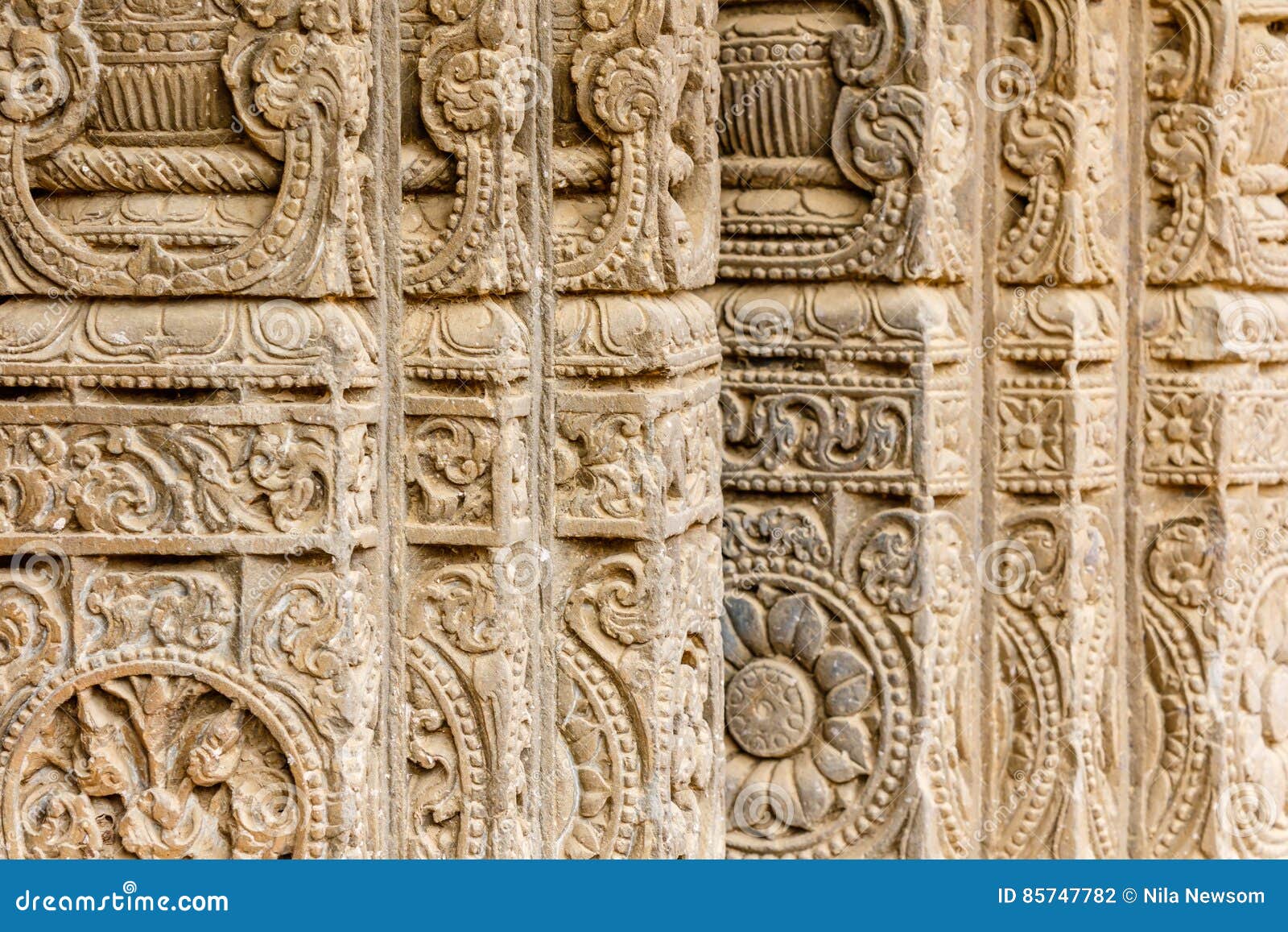carved pillars at chand baori
