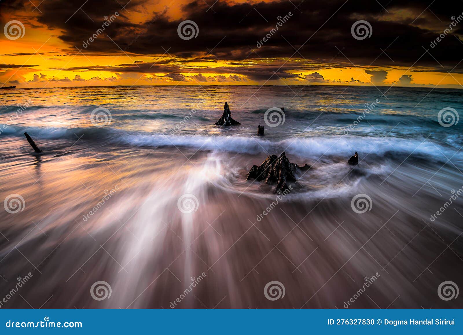 carving the beach with smooth waves and sunsets