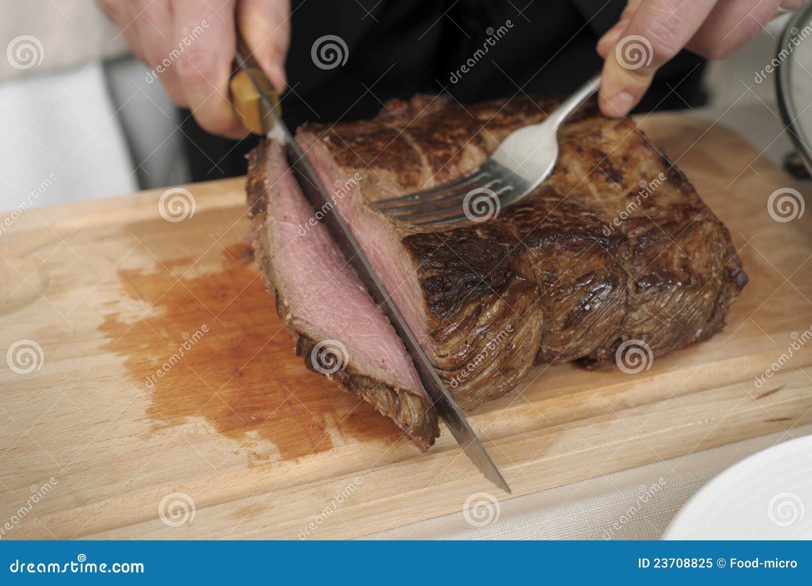 Carving roast beef stock image. Image of chopping, work 23708825