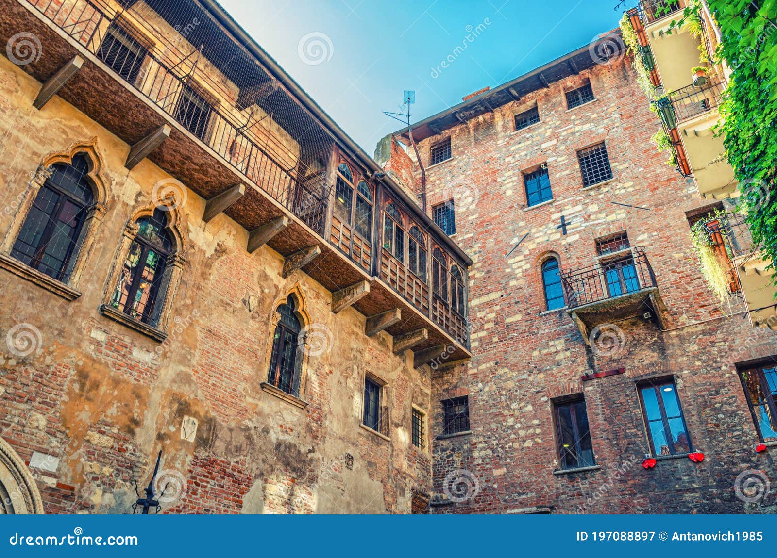 casa di giulietta with windows and brick wall of building, juliet capulet house courtyard in verona