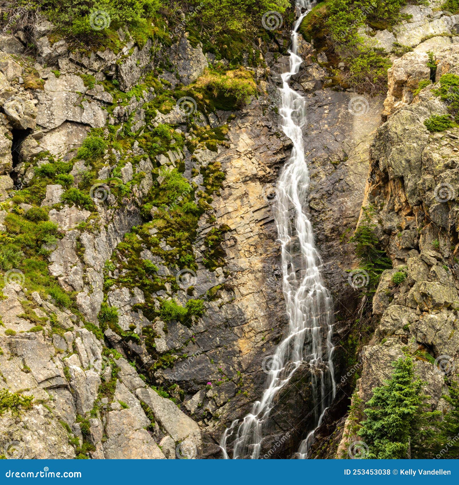 Cascade Of Water Falls Over Mossy Cliff Face Stock Photo Image Of