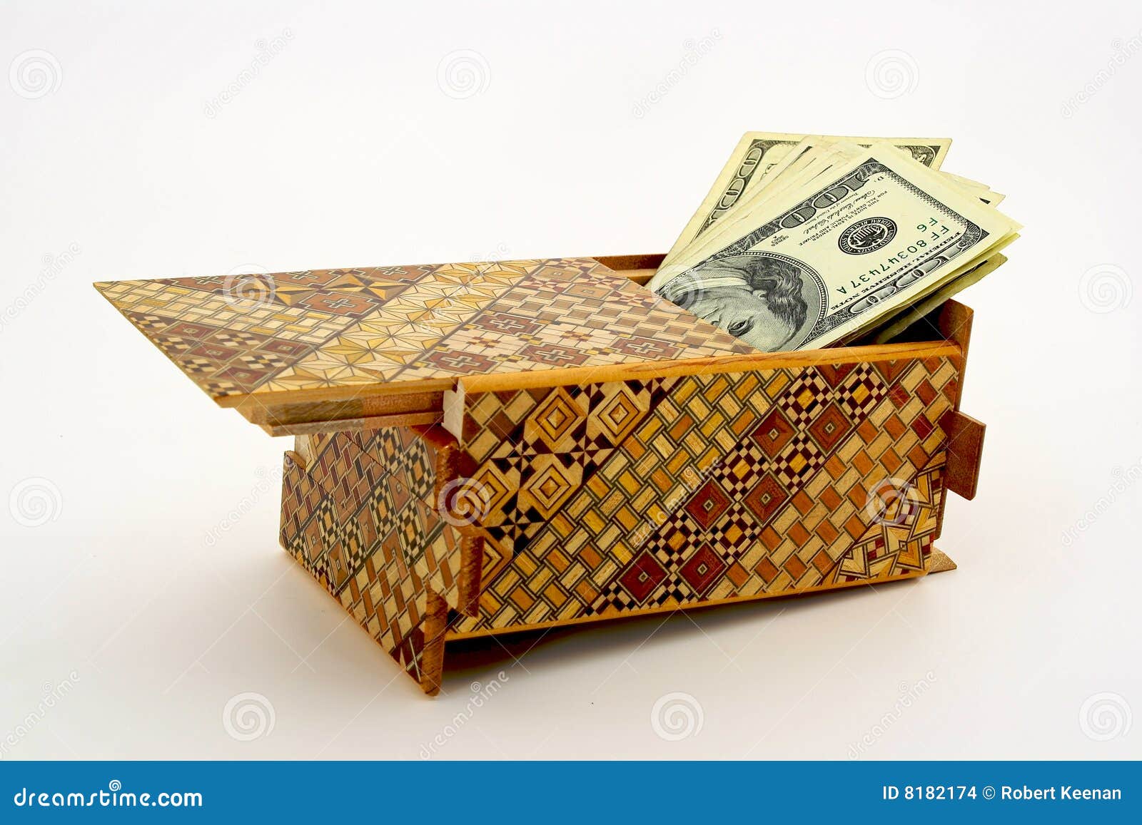 Cash Hidden In A Puzzle Box Stock Images - Image: 8182174