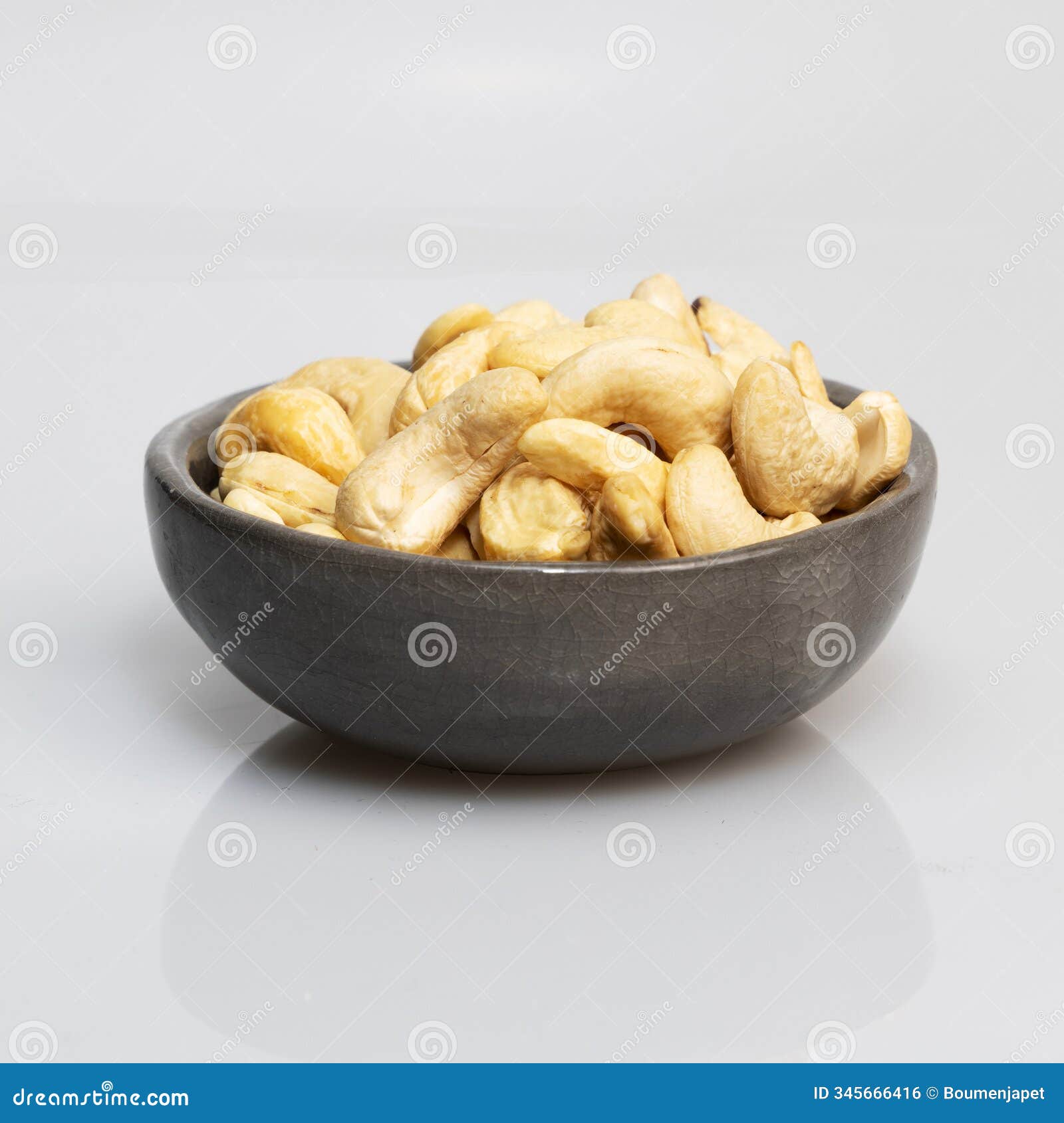 cashew nuts in grey bowl