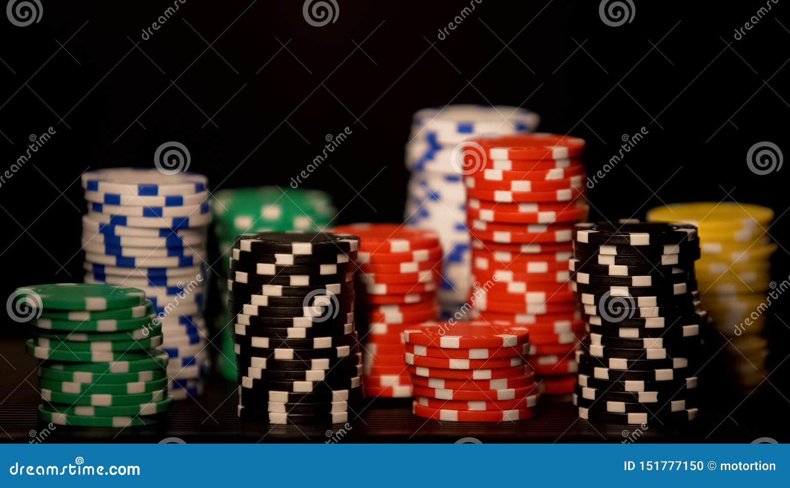 casino chips stacks  on black, risky all-in bet, underground casino