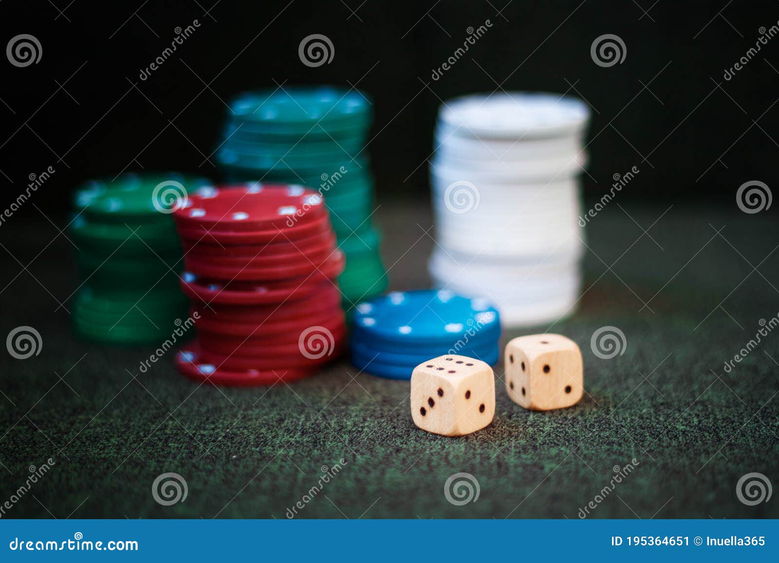Casino Poker Chips Stack Dice on Green Felt Background Stock Image