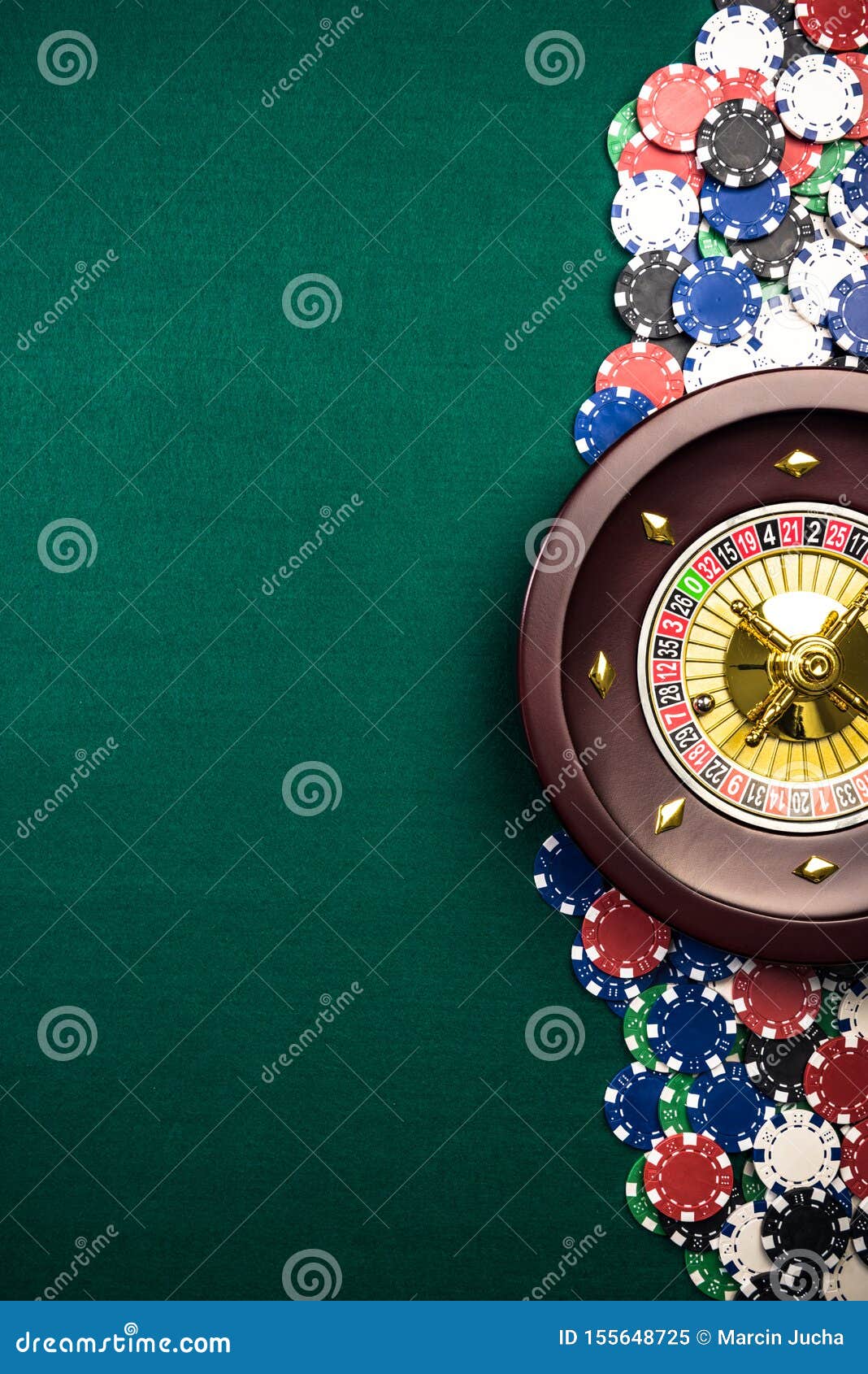 Casino Roulette Background with Roulette Drum,Casino Chips on Green