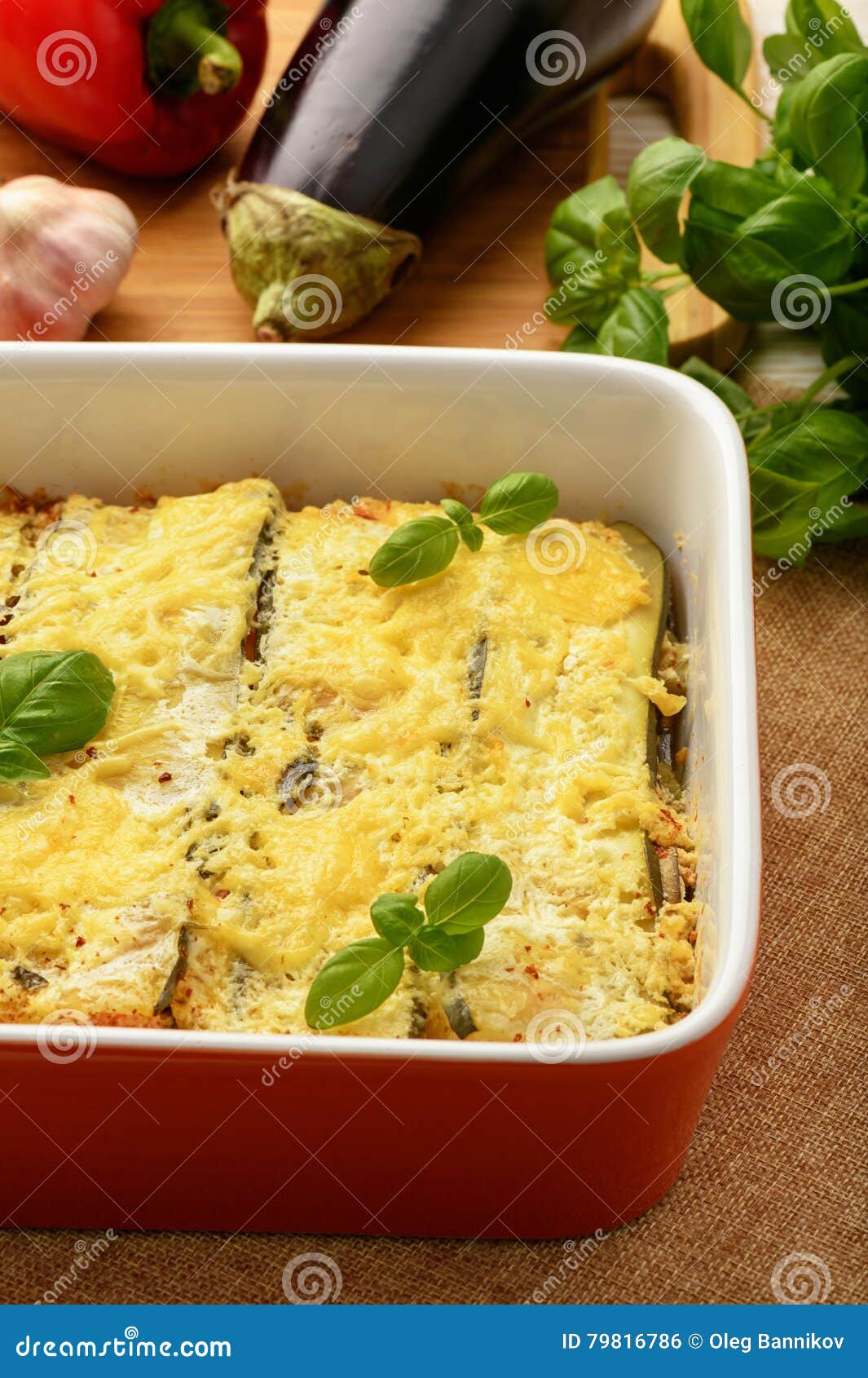 Casserole with Chicken, Eggplant, Zucchini and Tomatoes. Stock Photo