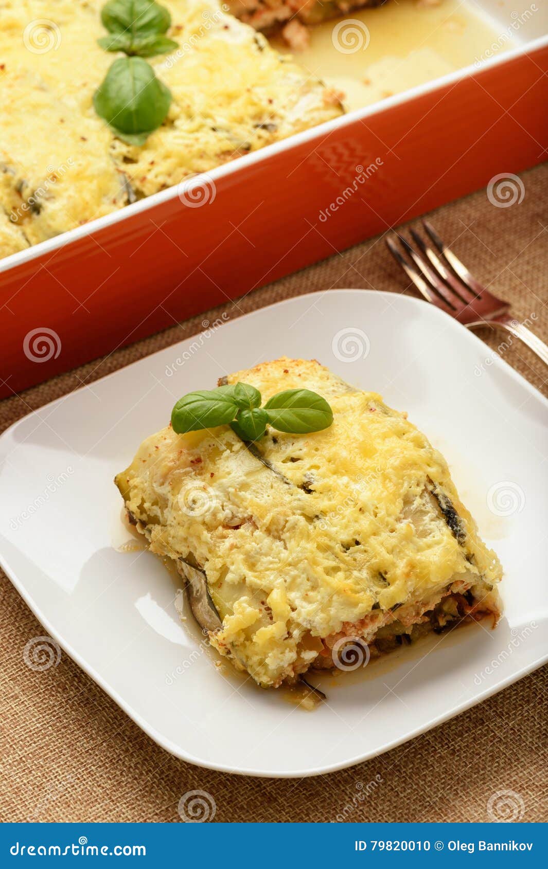 Casserole with Chicken, Eggplant, Zucchini and Tomatoes. Stock Photo