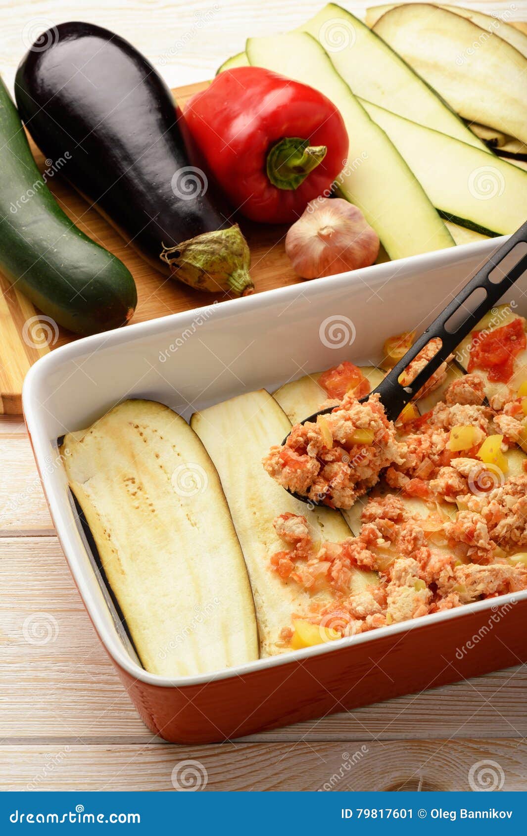Casserole with Chicken, Eggplant, Zucchini and Tomatoes. Cooking