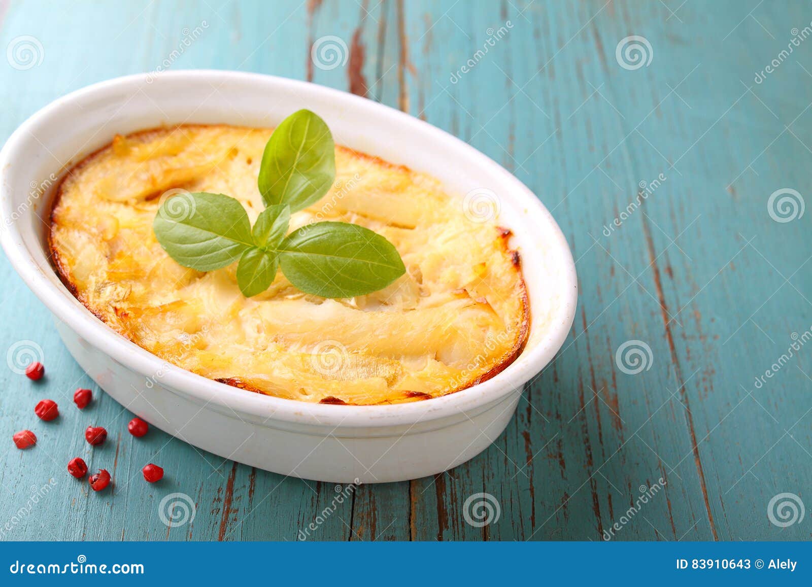 Casserole with Fish in a White Dish Stock Image Image of green