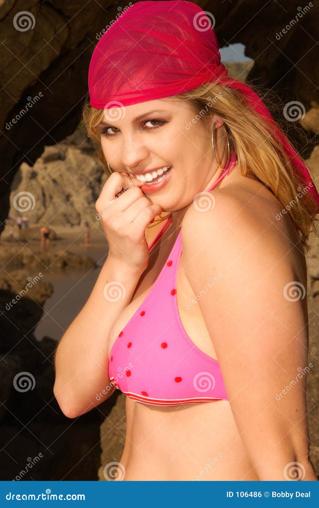 Cassie Bikini. Pretty blonde bikini model at the beach.