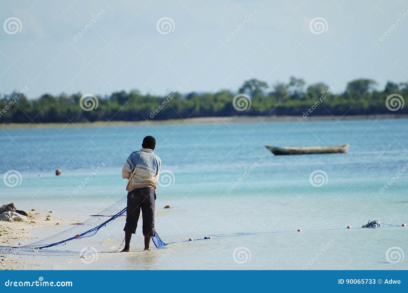 Cast Net Fishing - Zanzibar - Tanzania Editorial Stock Photo - Image of fish,  water: 90065733