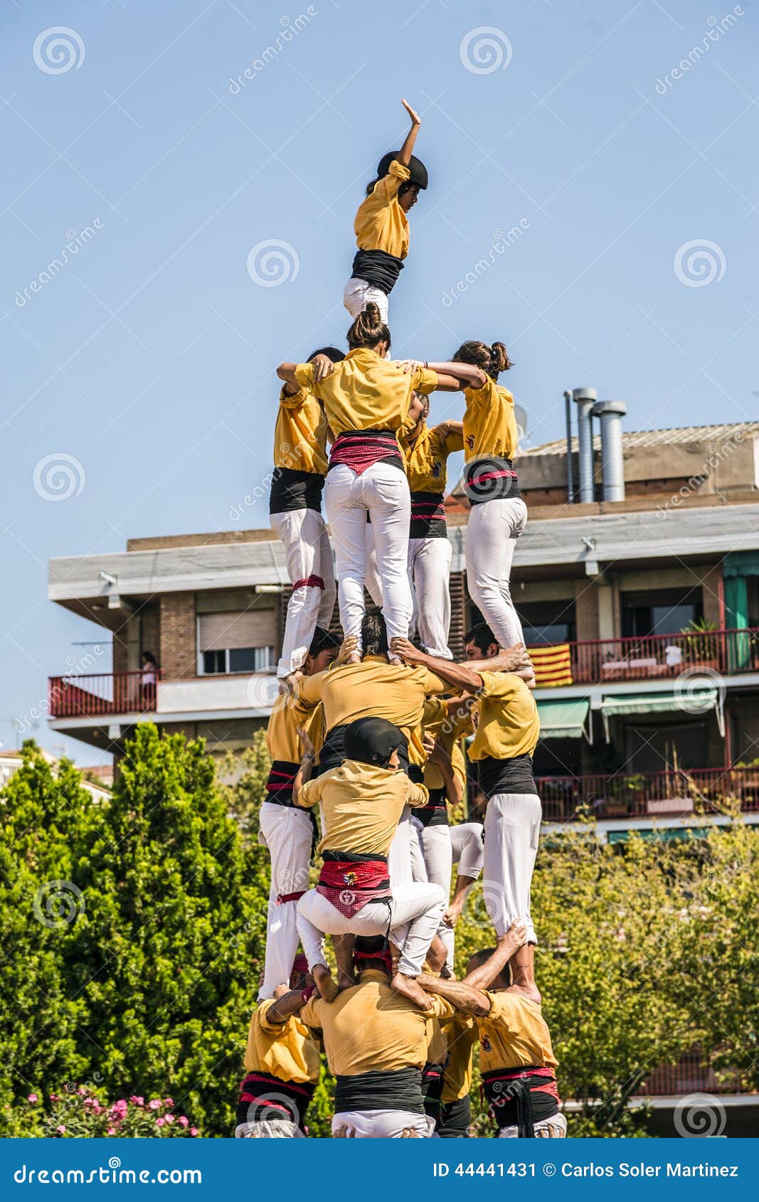 Castellers Do a Castell or Human Tower, Typical in Catalonia. Editorial ...