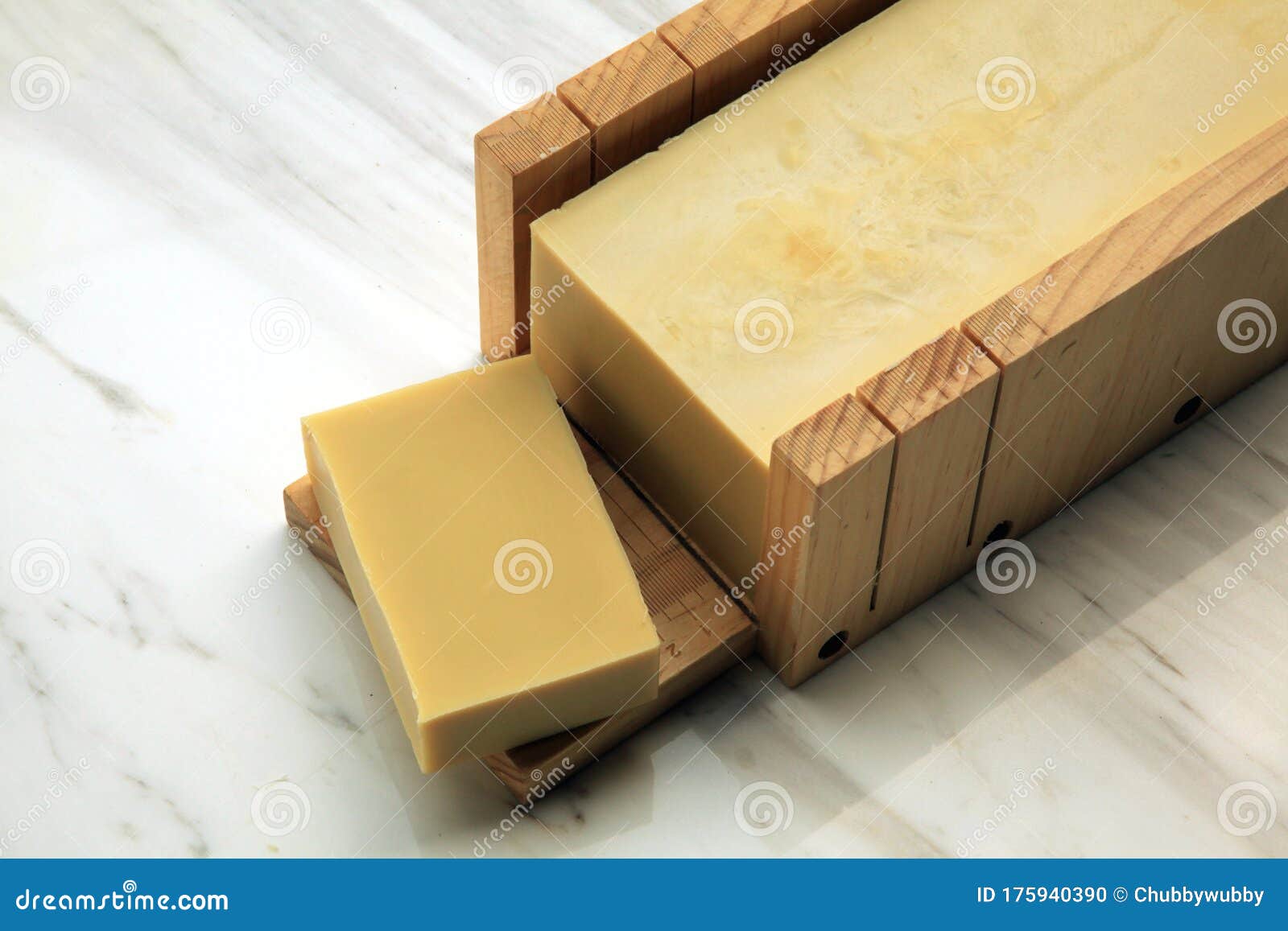 castille soap made with extra virgin olive oil displayed on marble backdrop