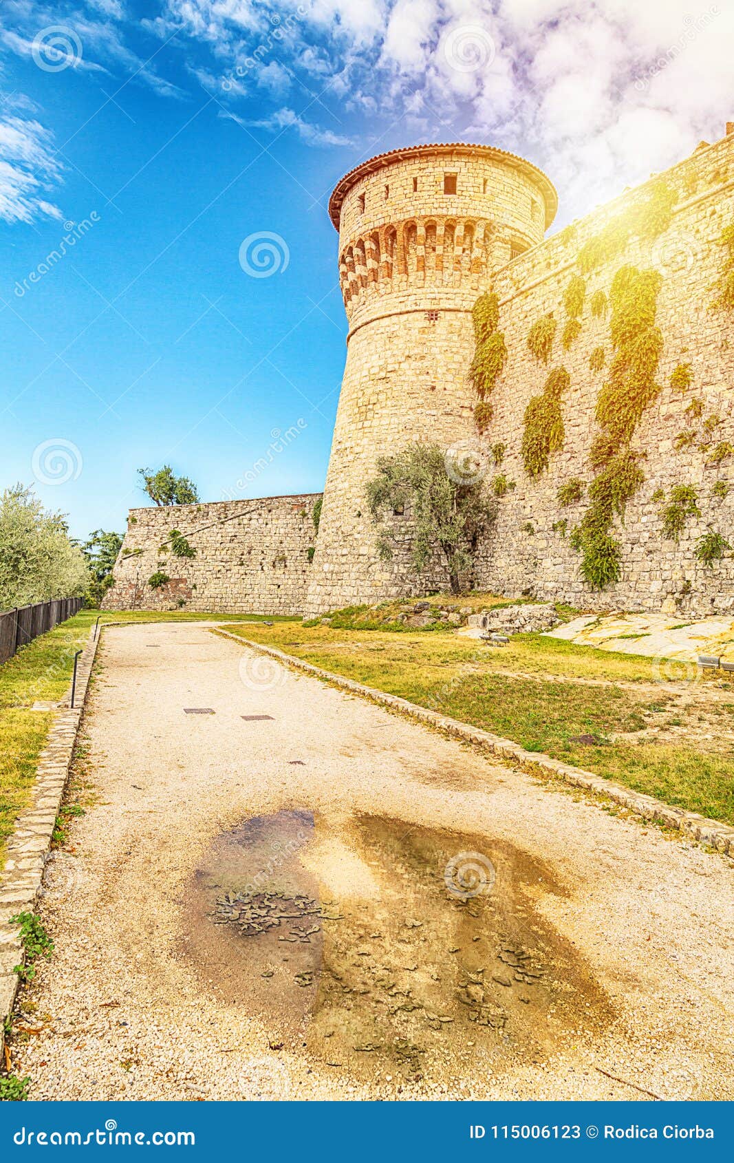 the sunrise on majestically castle tower on cidneo hill in bres