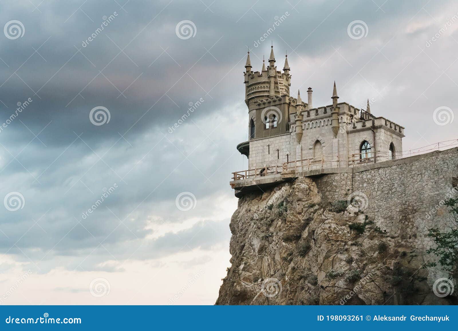 castle swallow`s nest, stands on a rock at the cliff on the background of the black sea.