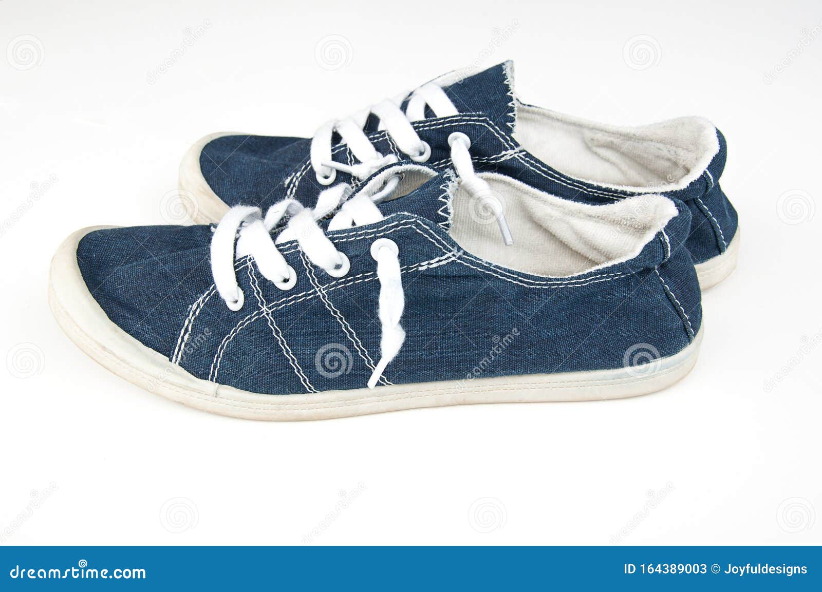 Casual Canvas Blue Shoes Isolated on Light Background Stock Image ...