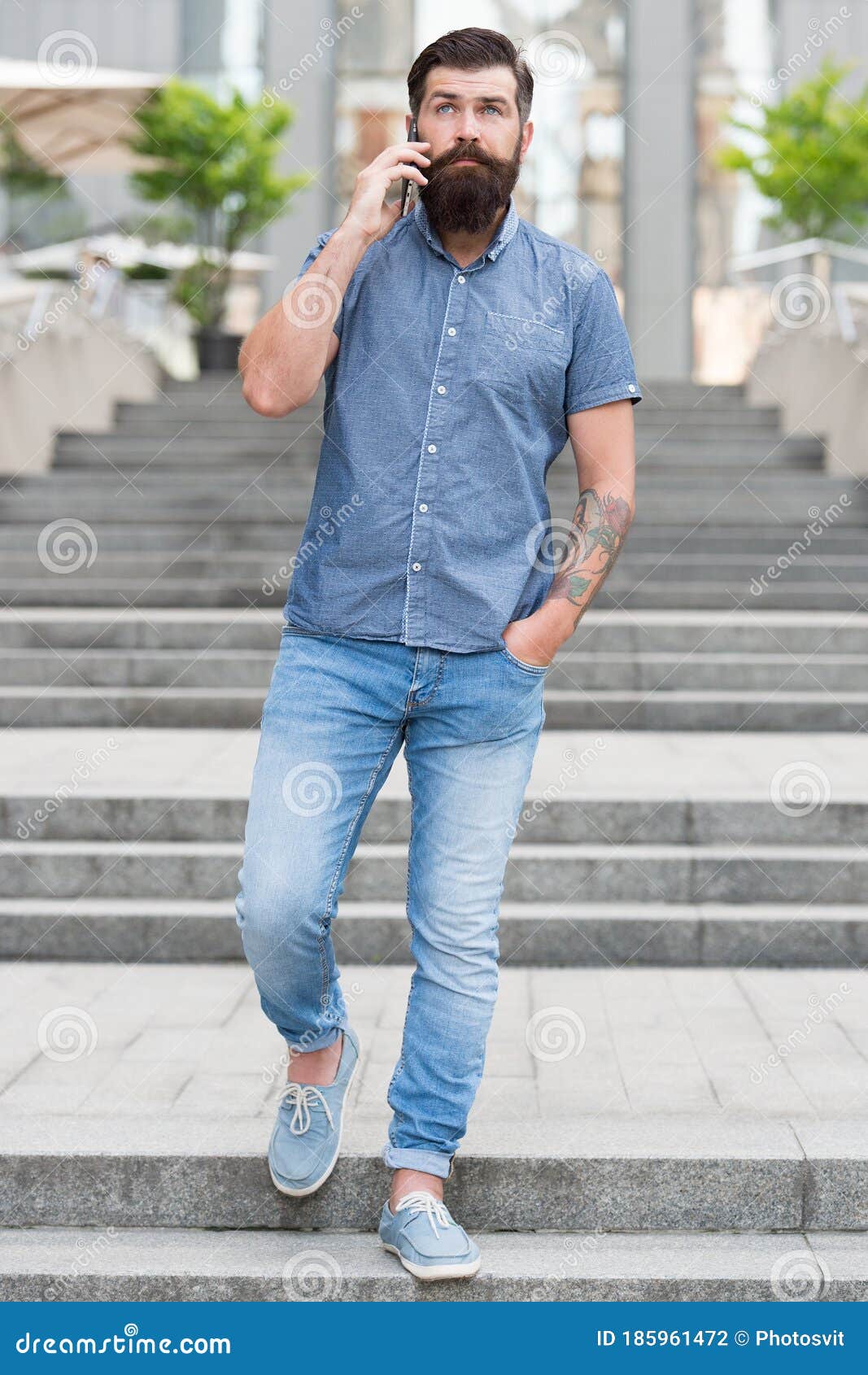 Casual Conversation. Hipster in Casual Style Urban Outdoor. Bearded Man  Talk on Mobile Phone Stock Photo - Image of comfort, denim: 185961472