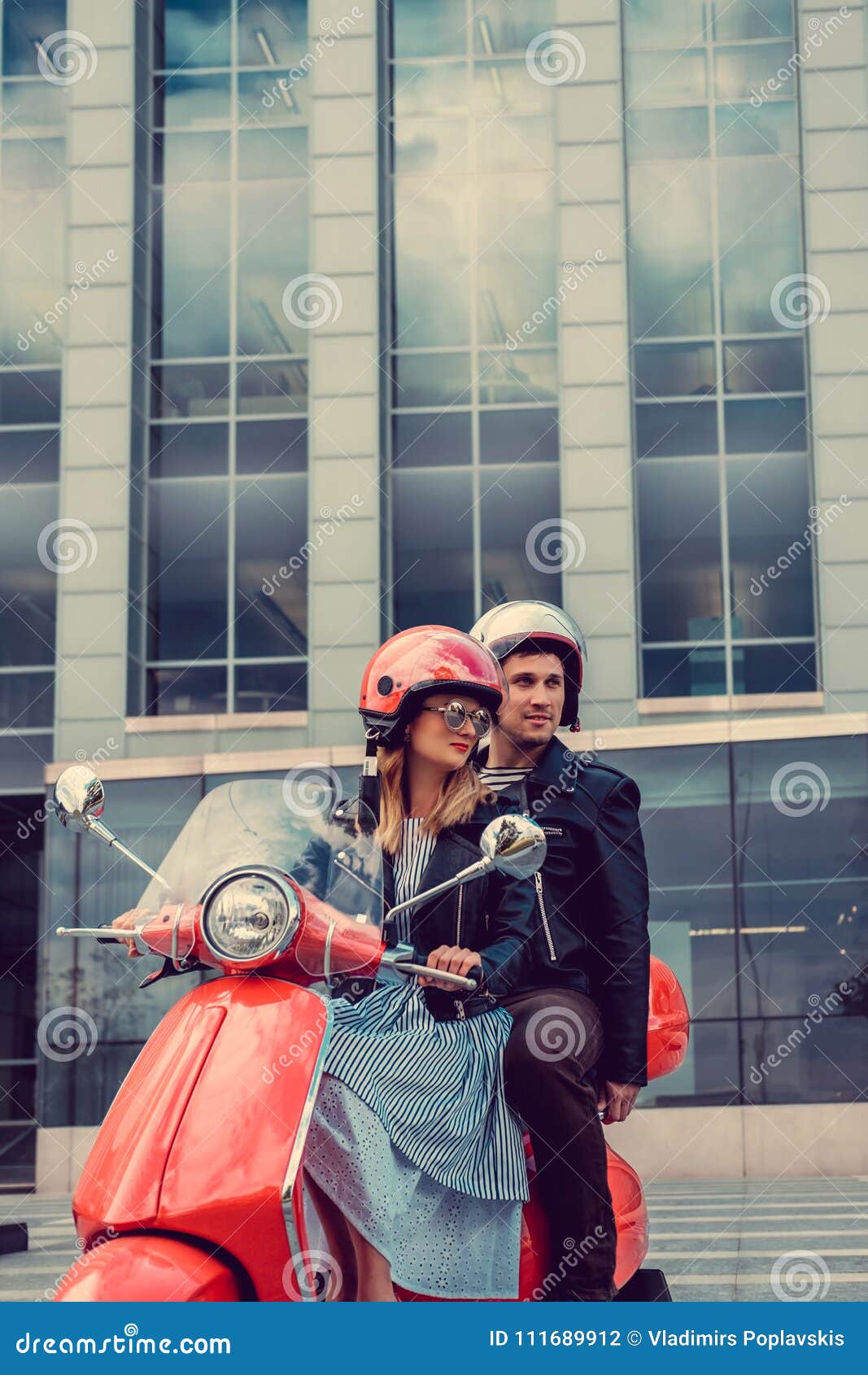 Male And Female Having Fun On Moto Scooter Stock Photo I