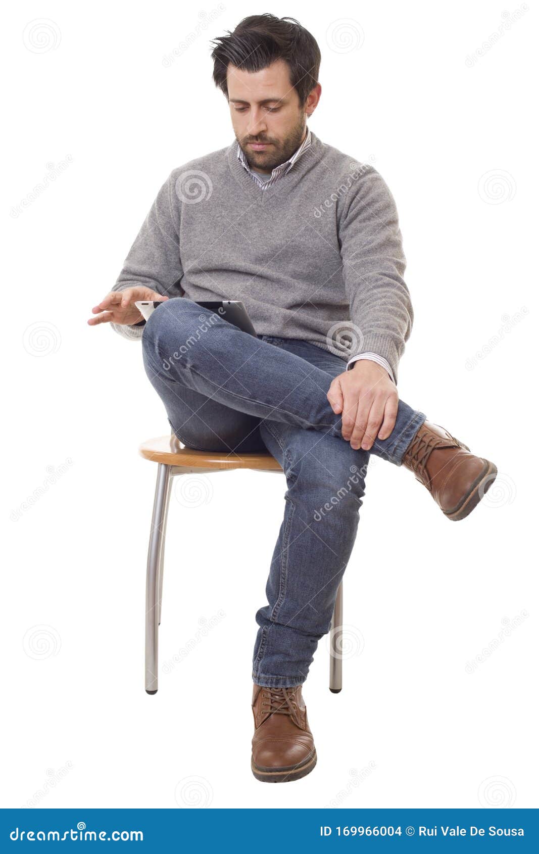 Casual man on a chair stock photo. Image of happiness - 169966004