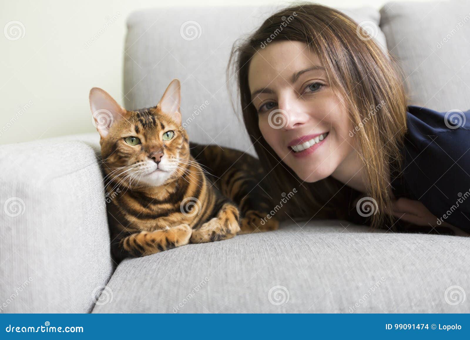 Cat and Woman in the Living Room on the Couch Stock Photo - Image of ...