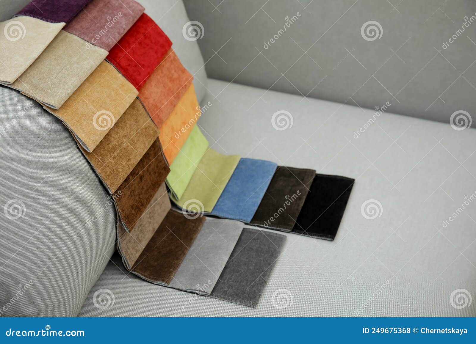 Catalog of Colorful Fabric Samples on Grey Sofa Stock Photo Image of