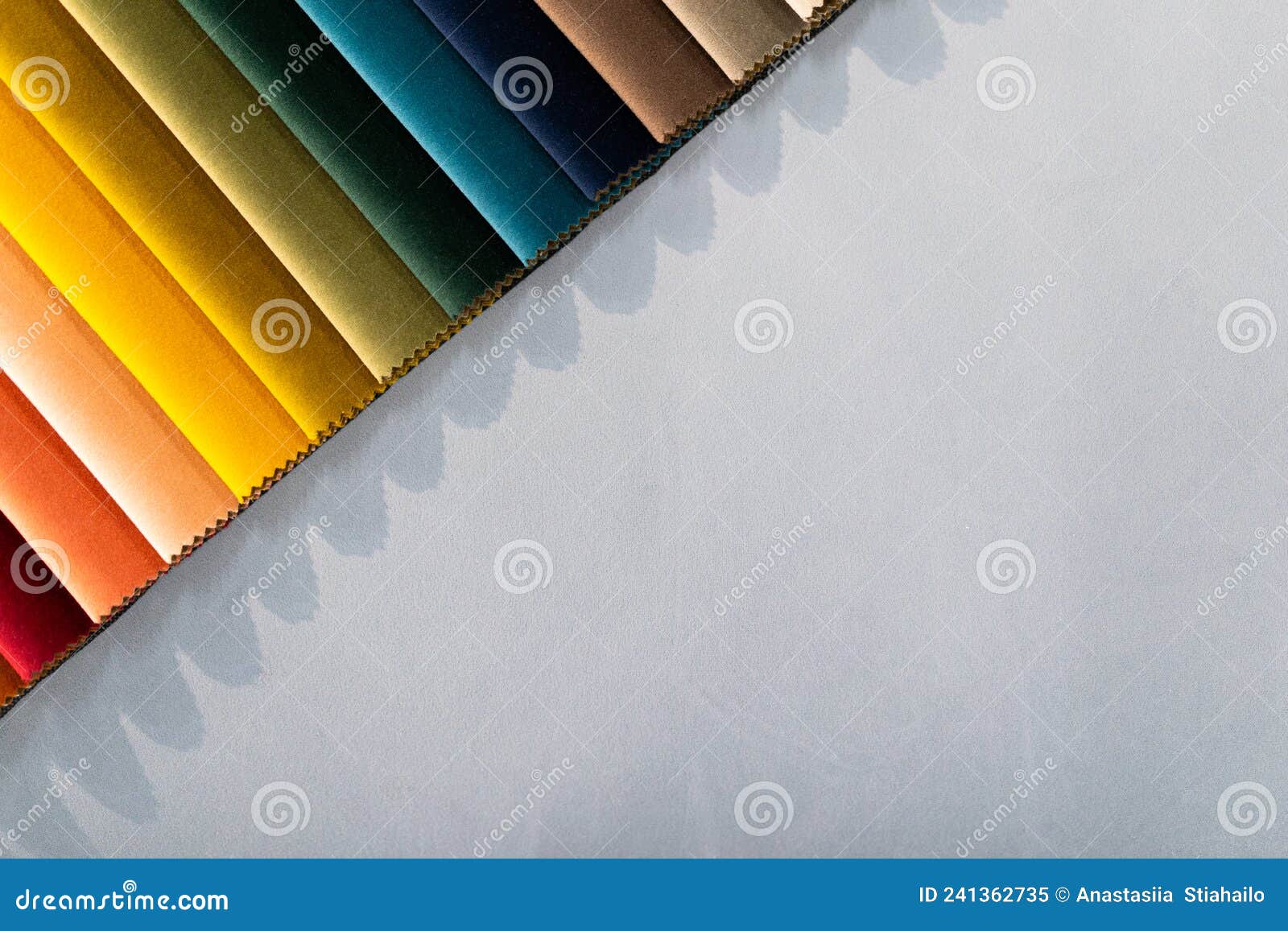 catalog of multi-colored fabric samples. textile industry background. colored cotton fabric. palet