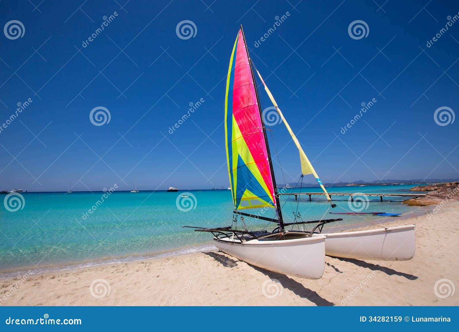 Catamaran Sailboat In Illetes Beach Of Formentera Stock ...