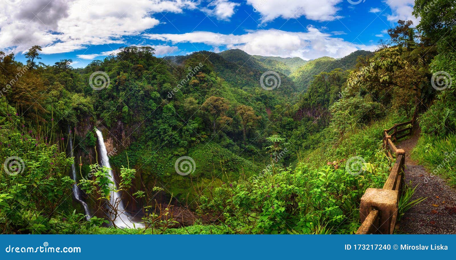 catarata del toro waterfall with surrounding mountains in costa rica