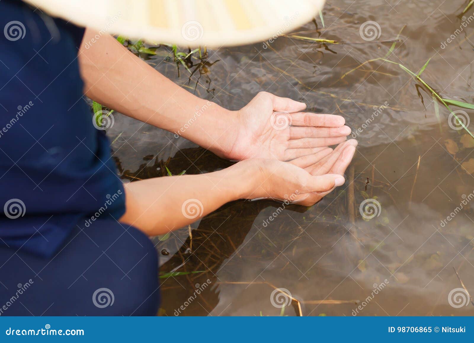 Catching water in river stock image. Image of clean, help 98706865