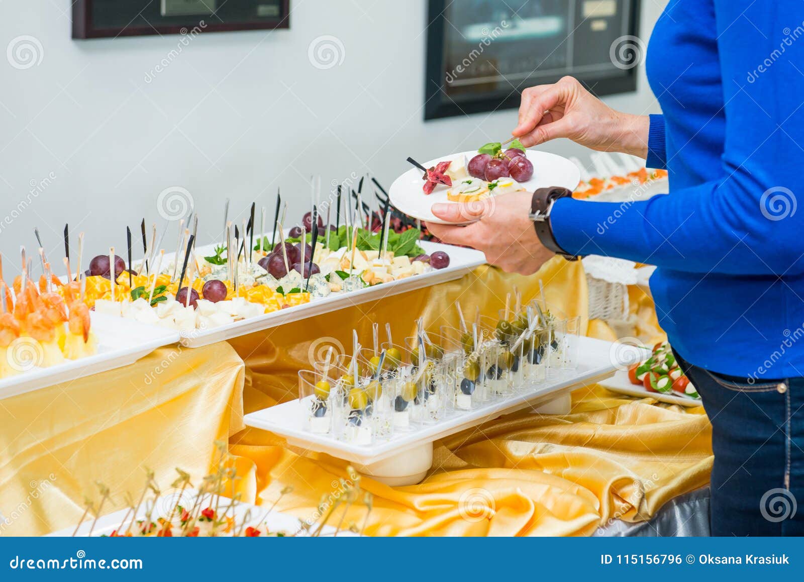 Catering Buffet Table with Food and Snacks for Guests of the Event